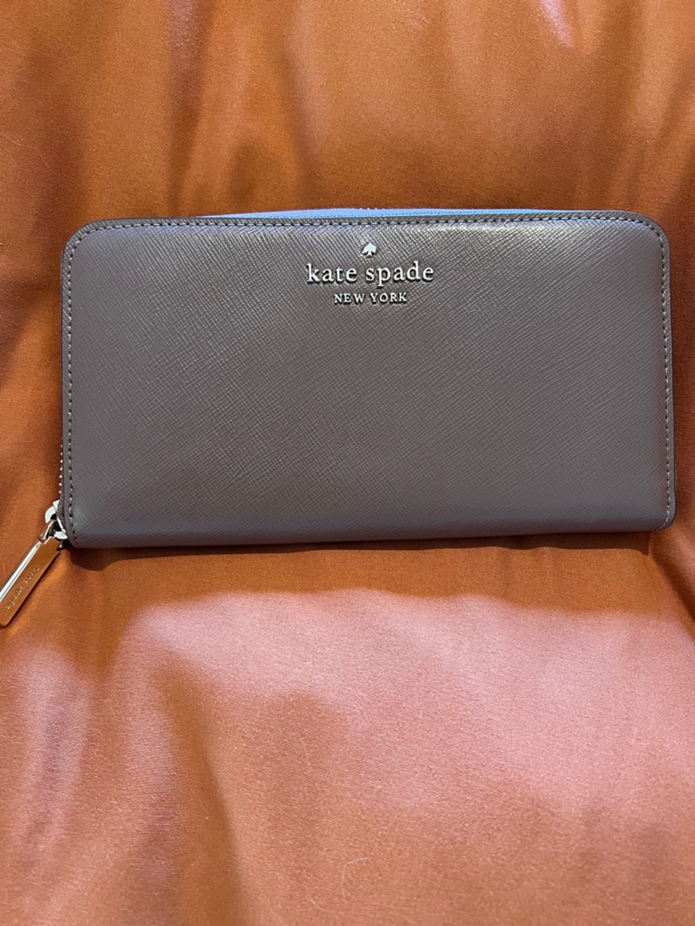 kate spade gray zip-around leather wallet